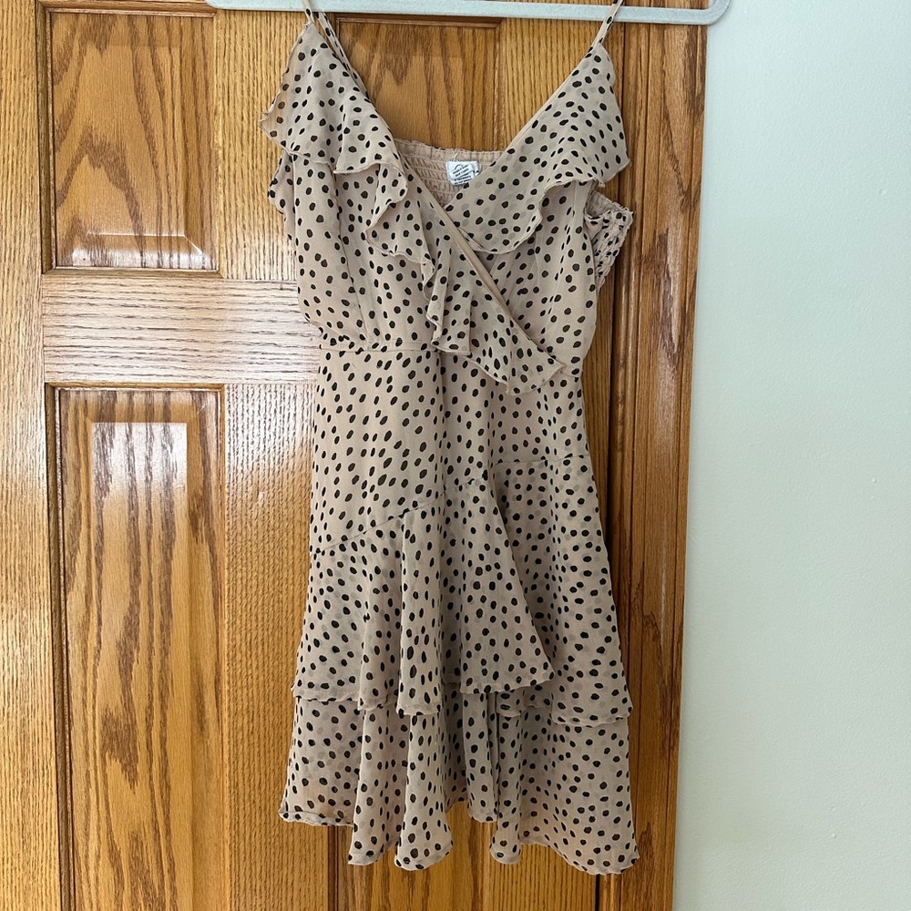 tan and black polkadot ruffle romper